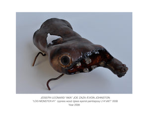 "LOG MONSTER #1"  sculpture/cypress wood /glass eye /paint-epoxy/L14"xW7' Year 2009